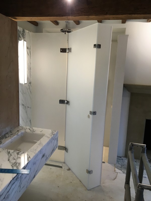 Bespoke frosted glass shower enclosure in Finsbury Park luxury bathroom