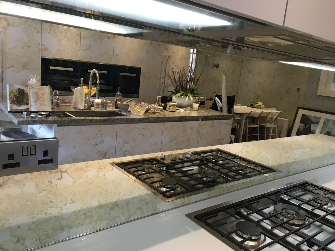 Mirror glass splashback in Finsbury Park luxury kitchen